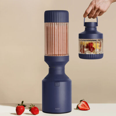 Beast blender for smoothies with small carrying cup.