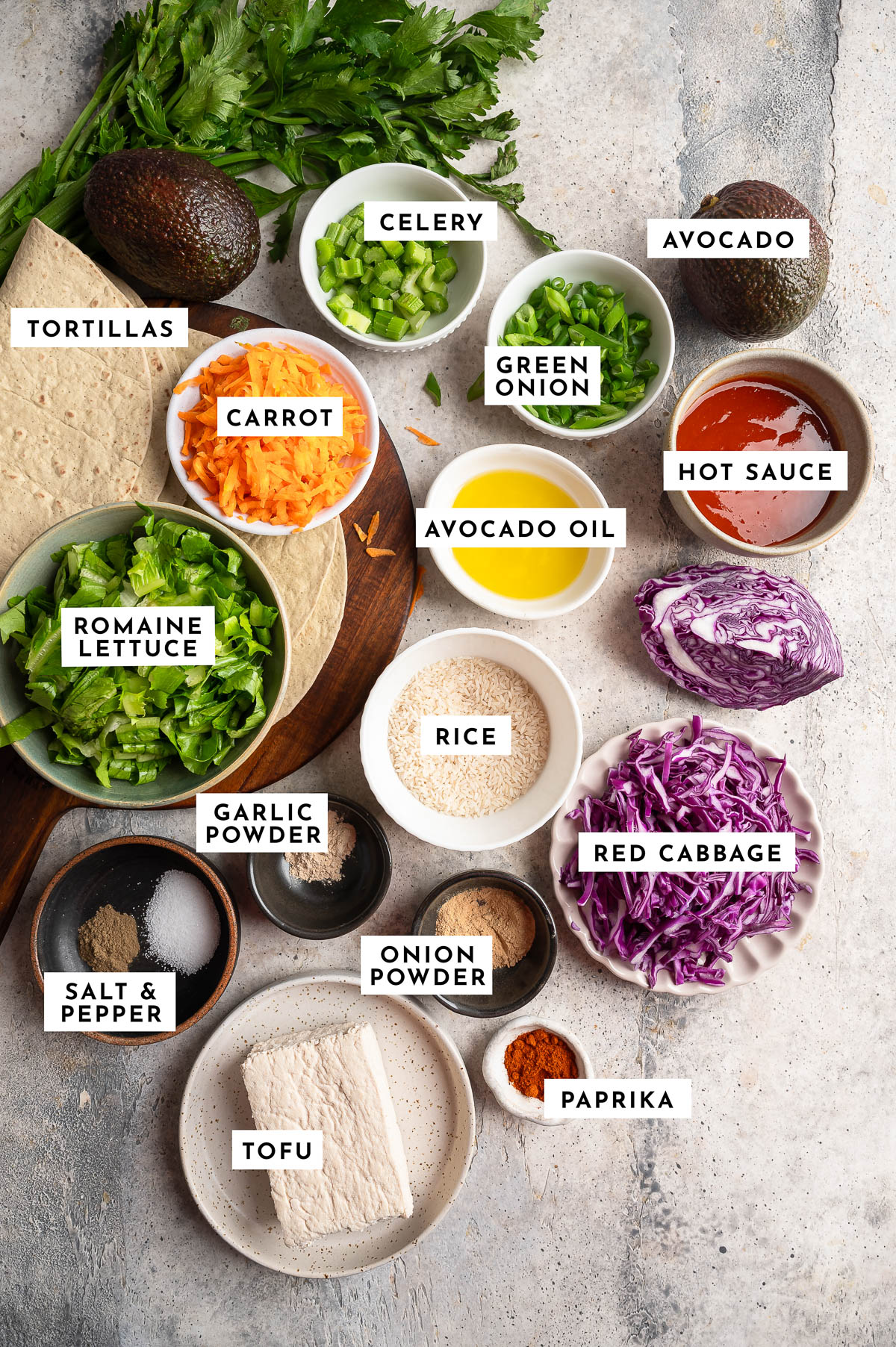 Ingredients for buffalo shredded tofu wraps laid on the table.