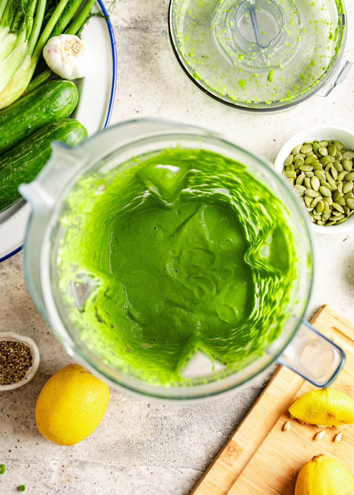 A smooth and creamy green goddess dressing freshly blended.