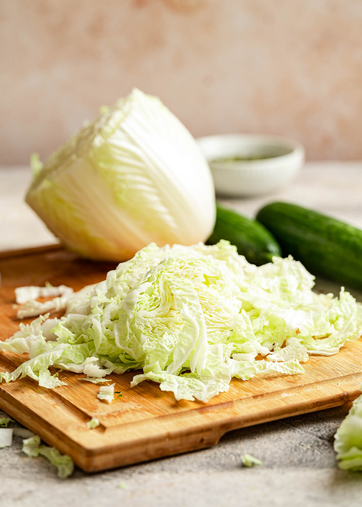 Chopped cabbage on a cutting board.