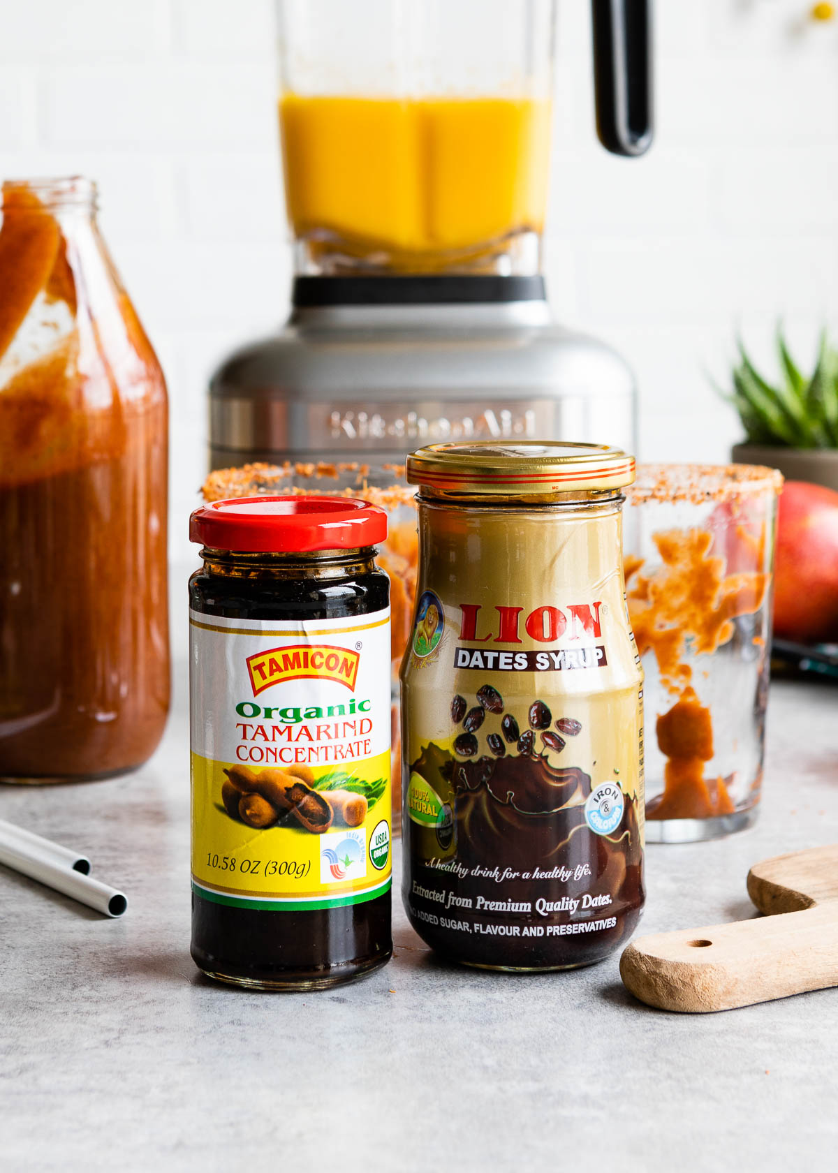 Tamarind paste and date syrup In glass jars.