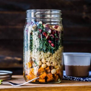 mason jar salad recipe with sweet potatoes and kale.