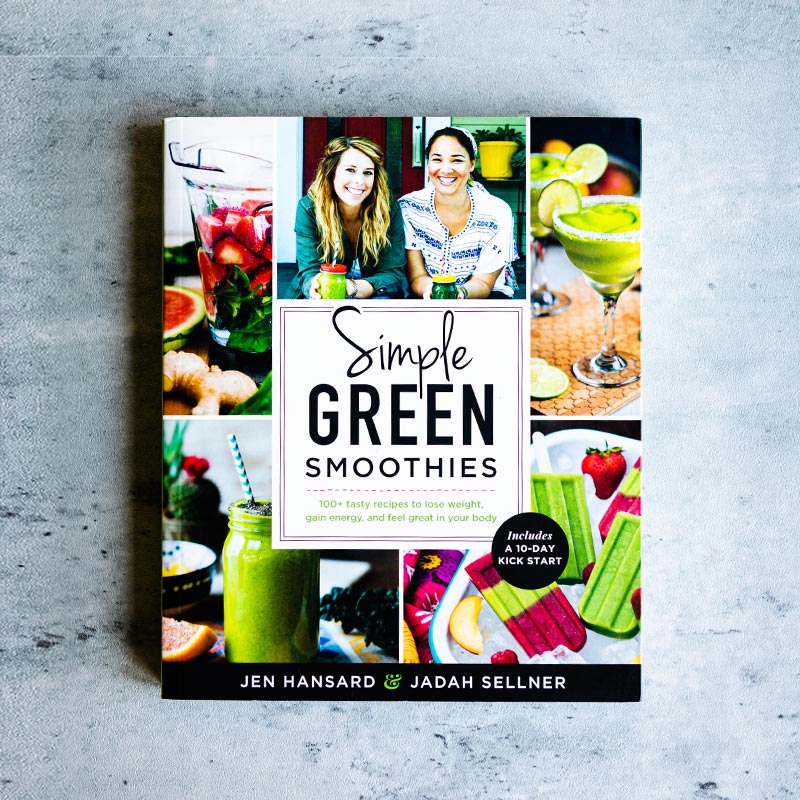 Simple green smoothies cookbook on table