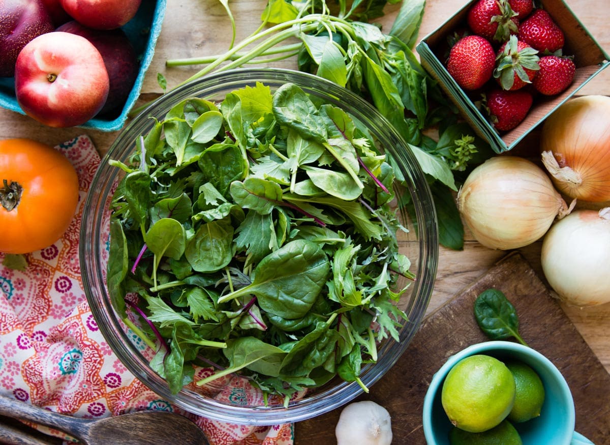 vibrant array of green vegetables for a plant based meal in a glass bowl.
