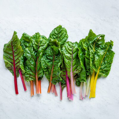 Bunch of Swiss chard on counter.