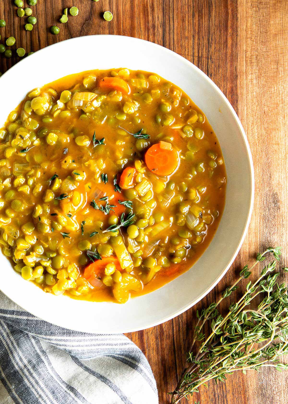Simple vegetarian split pea soup recipe in a white bowl.