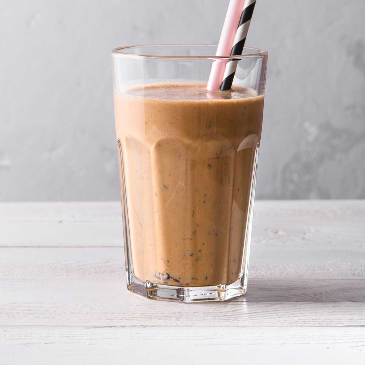 Glass of a delicious chocolate weight loss shake for a healthy breakfast smoothie.